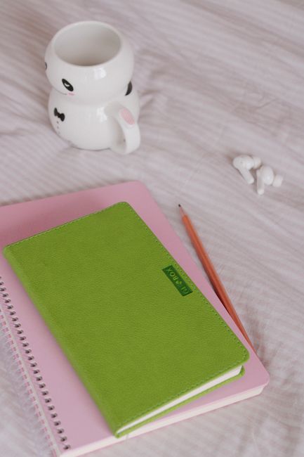 Rustic ceramic mug open notebook pen